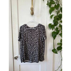 Women’s size large black and white cheetah print top